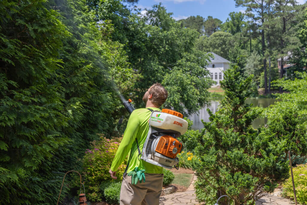 Simply Green Lawn Care Technician Using Mosquito Fogger