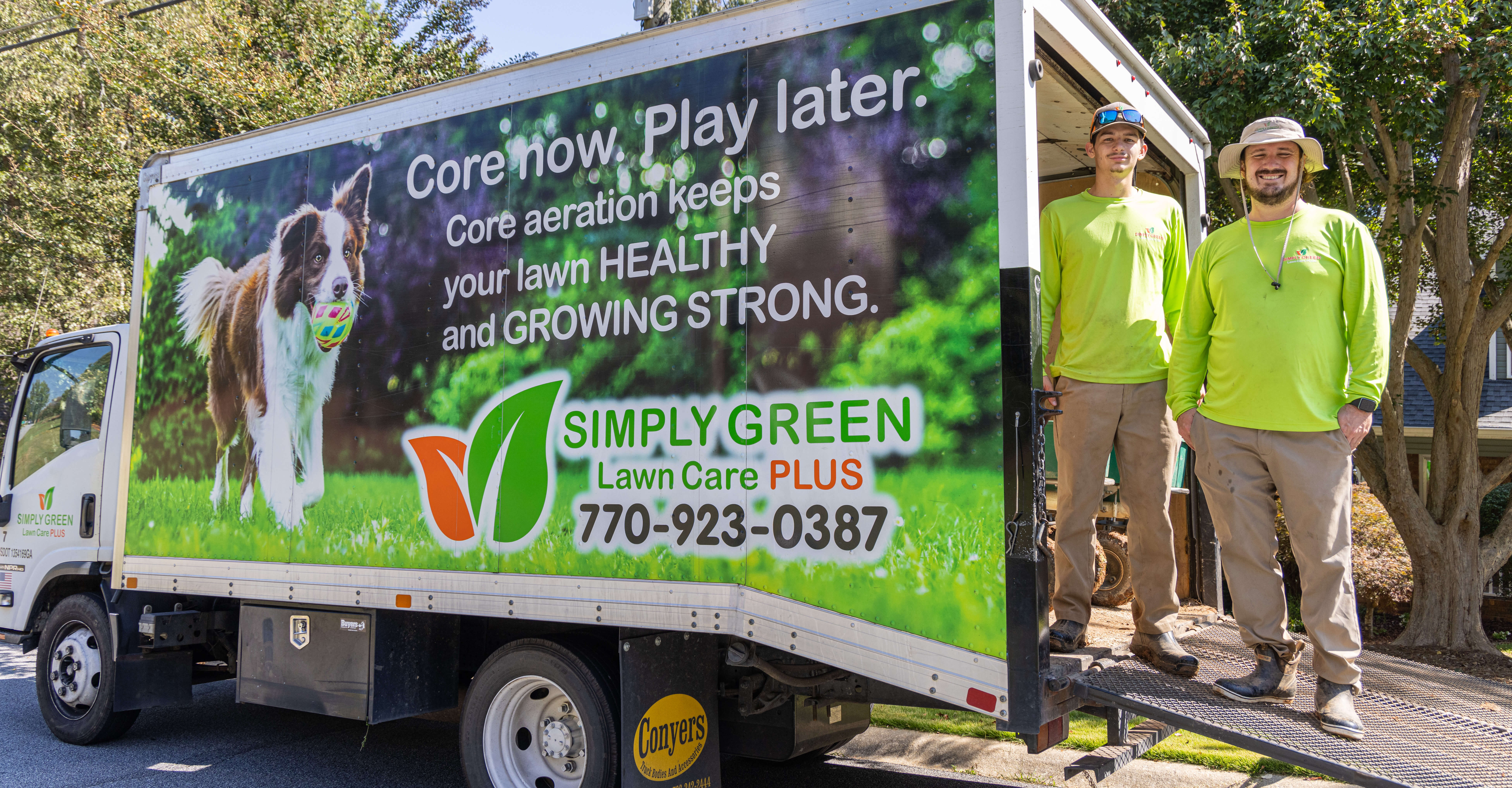 Simply Green Team Members by Service Truck